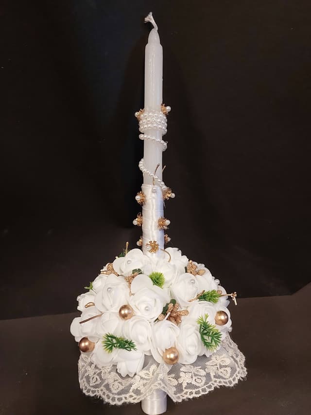 Holy communion - decorated candle.